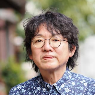 佐田憲映教授の顔写真